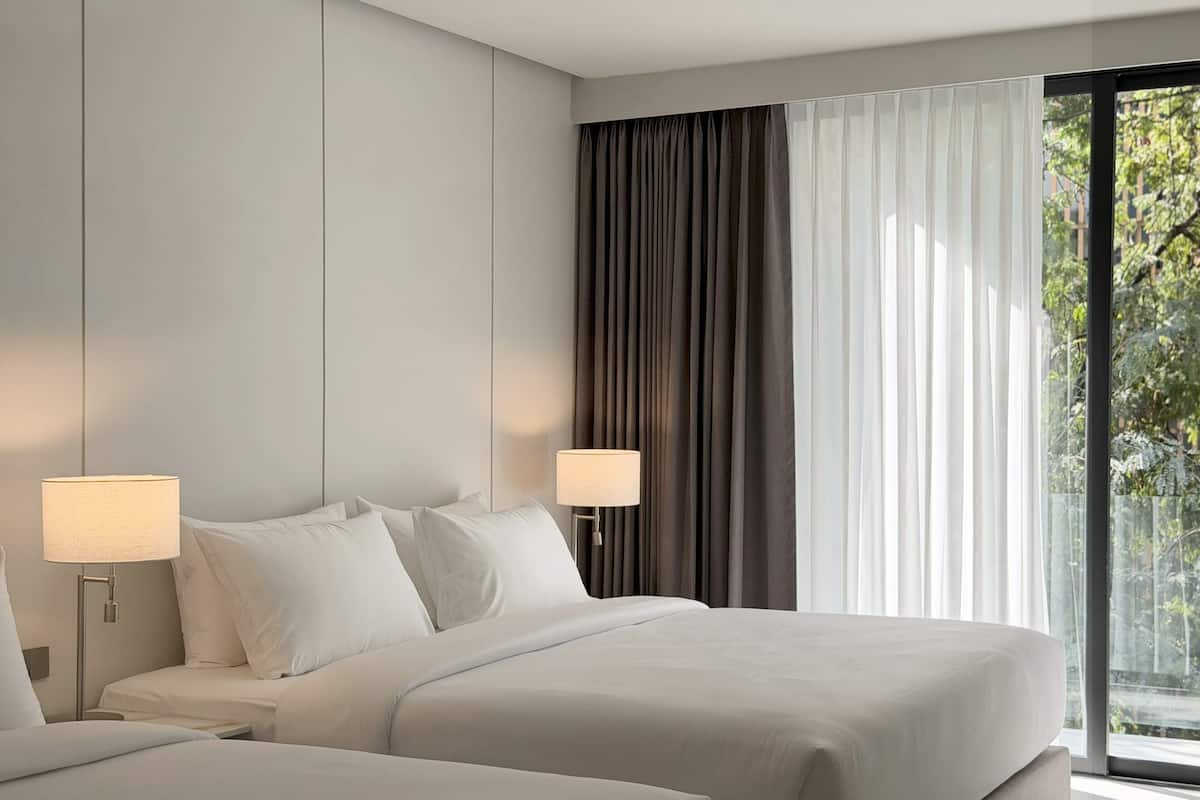 Quadruple Room, Multiple Beds, Non Smoking | In-room safe, desk, laptop workspace, soundproofing