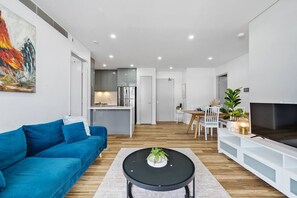 TV - Olympic Park Oasis | 2BR + Pool, Sauna & Parking (Sydney Olympic Park)