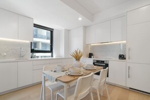 Coffee/tea maker, fridge, microwave, oven - Harbour Lifestyle • Modern 1BR in Prime Spot (North Sydney)