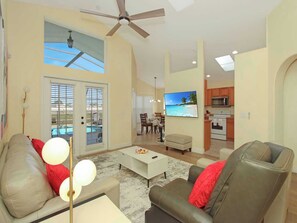 TV, fireplace, offices - Castle Reeds Waterfront Pool Home 10mins to Disney (Kissimmee)