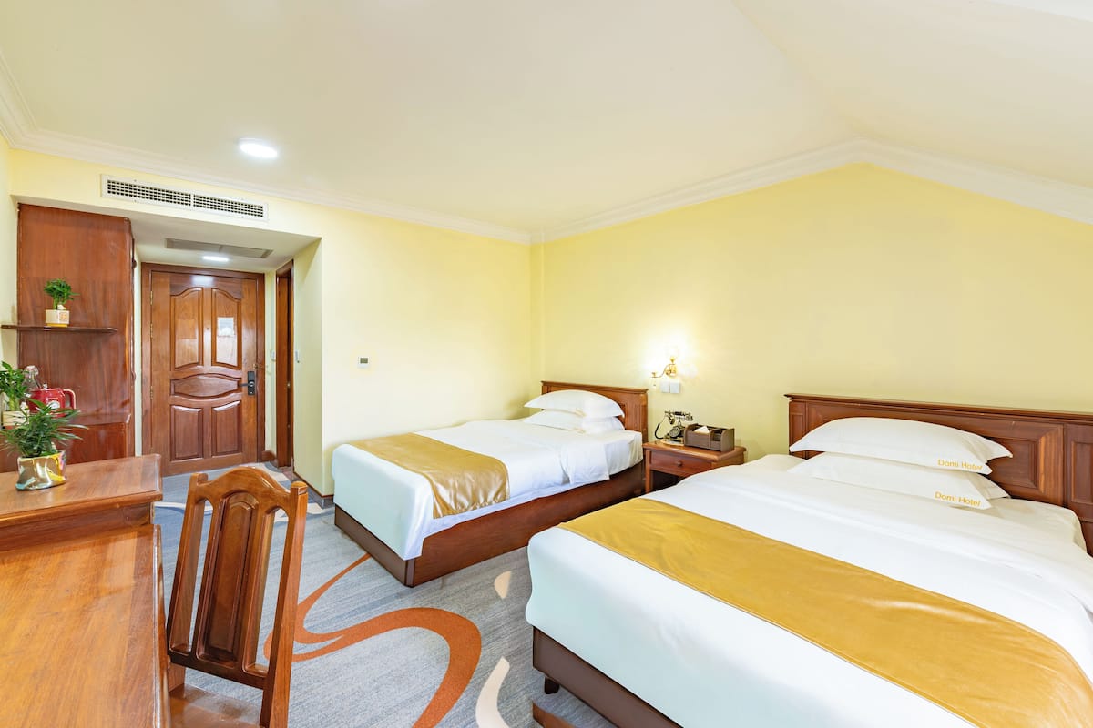 Deluxe Twin Room, City View | Desk, cribs/infant beds, free WiFi, bed sheets