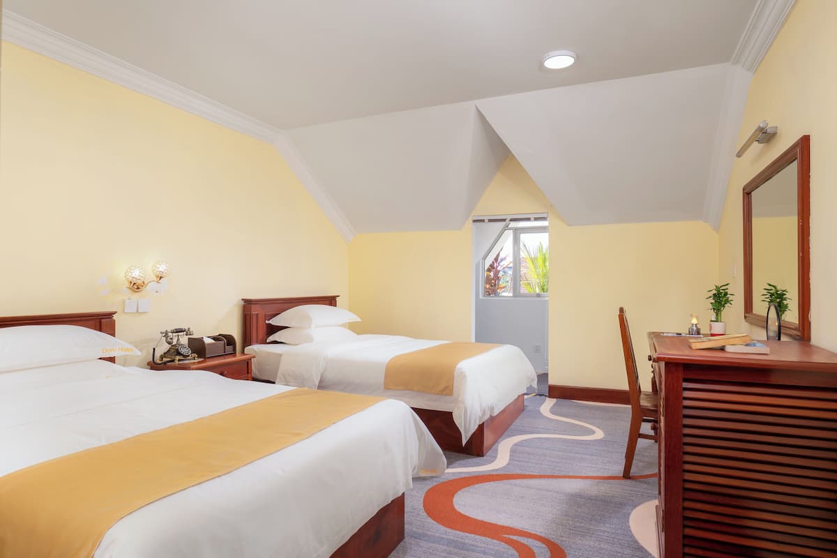 Premium bedding, pillow-top beds, desk, free WiFi