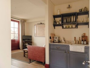A refreshments area that earns its keep, with Dualit appliances, Grind coffee and Joe's Tea Co.