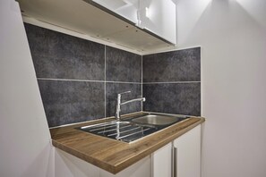 Coffee/tea maker, fridge, microwave, stovetop - Charming Apartment Center of Paris (Paris)
