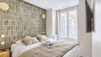 Desk, iron/ironing board, free WiFi, bed sheets