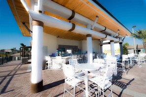 Townhome, Multiple Beds, Pool Access, Pool View (Be our guest At Championsgate) | Outdoor dining