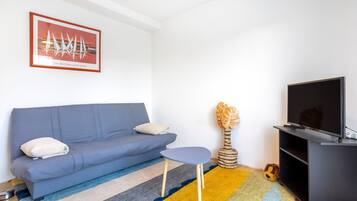 Télévision, table de tennis de table