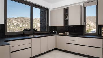 Villa, Sea View | Private kitchen | Full-sized fridge, microwave, oven, stovetop