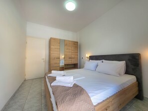 Iron/ironing board, Internet, bed sheets - ARETI Deluxe Two - Bedroom Suite n. 101 By SDR (Olimpiaki Akti)