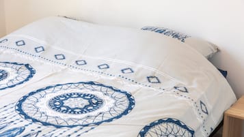 Fer et planche à repasser, draps fournis