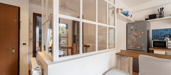 GuestHost - Cozy 70 square meters apartment, perfect for four people, spread over two levels (ground floor and basement) within a building (NO elevator).The property is located in the charming seaside town of Sistiana, in the Duino-Aurisina area, about a