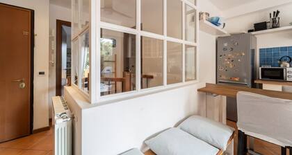 GuestHost - Cozy 70 square meters apartment, perfect for four people, spread over two levels (ground floor and basement) within a building (NO elevator).The property is located in the charming seaside town of Sistiana, in the Duino-Aurisina area, about a
