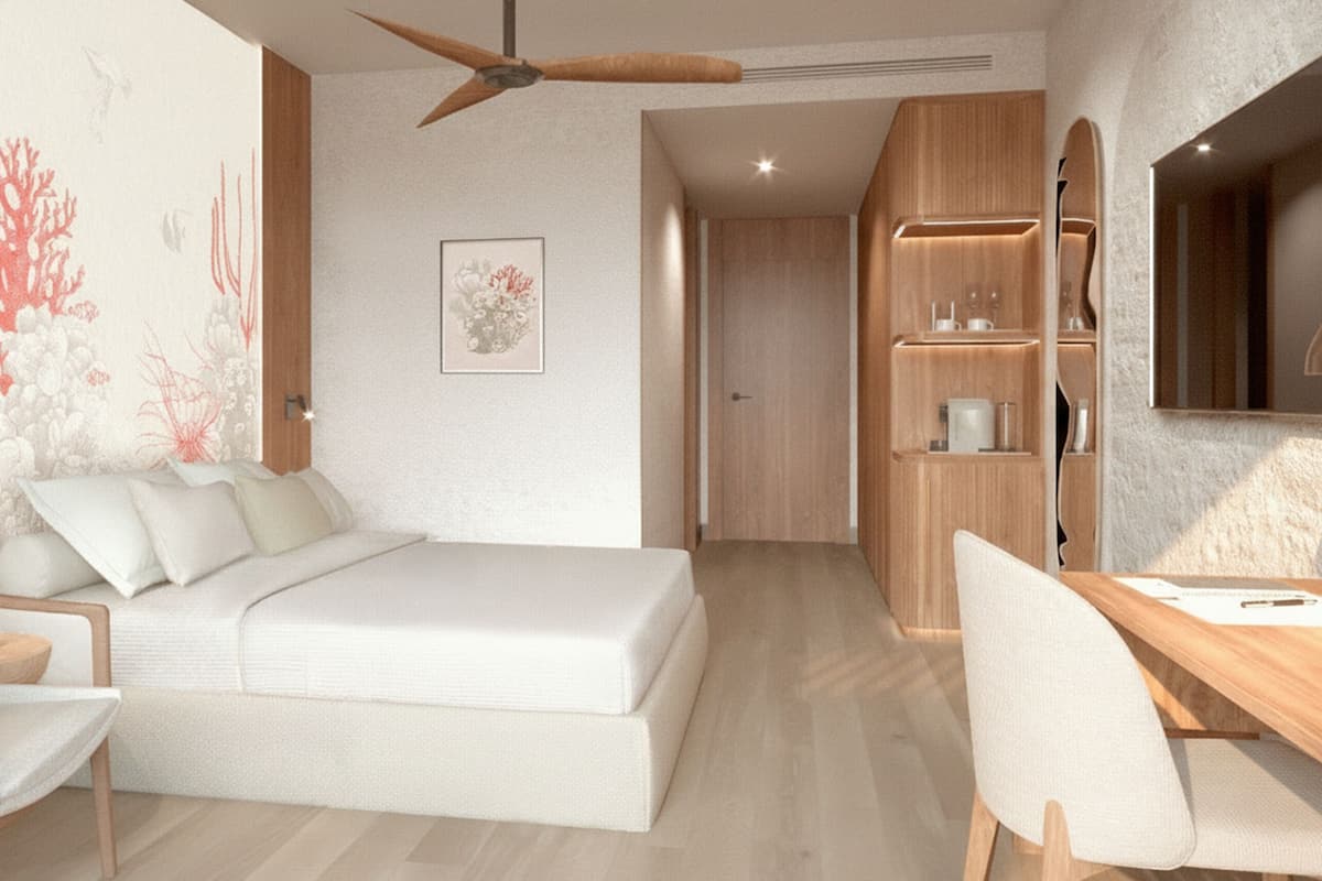 A modern bedroom with a bed, a desk, a chair, a wardrobe, and a ceiling fan.