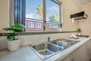 Villa, 2 Bedrooms, Non Smoking | Private kitchen | Full-size fridge, stovetop, cookware/dishes/utensils - Tasman Holiday Parks - Kalbarri (Kalbarri)