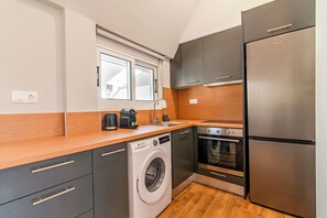 Panoramic Penthouse, Balcony | Private kitchen | Full-size fridge, oven, cookware/dishes/utensils