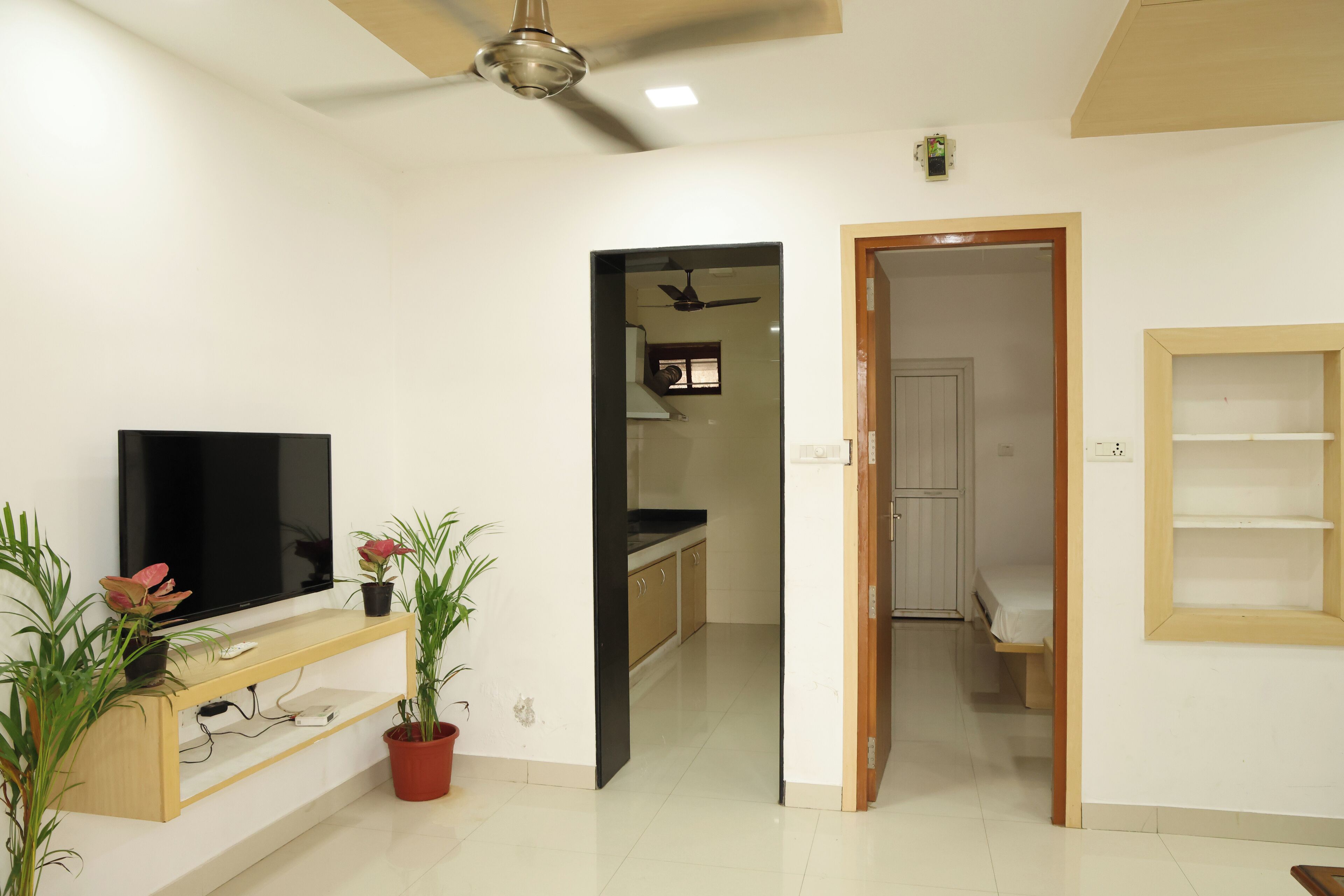 Deluxe Villa | Living area | 43-inch LED TV with satellite channels