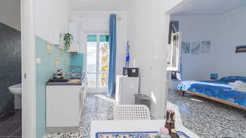 Comfort Apartment, Balcony, Sea View | Living area | Flat-screen TV