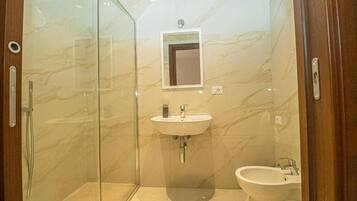 Shower, free toiletries, hair dryer, towels