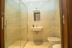 Shower, free toiletries, hair dryer, towels