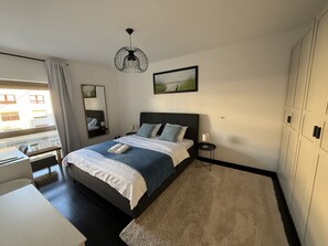 Comfort Apartment, Lanai, Courtyard View | Blackout drapes, soundproofing, iron/ironing board, free WiFi