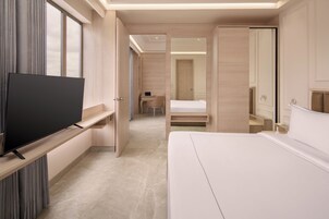 Suite | Caja fuerte, wifi gratis, ropa de cama y accesible en silla de ruedas