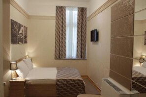 Superior Single Room, Courtyard View | In-room safe, laptop workspace, blackout drapes, iron/ironing board