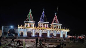 A building with two prominent towers, each topped with a spire, and a series of arches along the facade. - Kriya Yoga Wellness (Kakdwip)