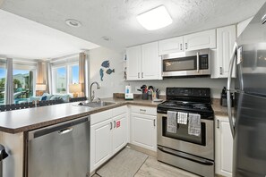 Coffee/tea maker, microwave, toaster - 3 BR Pet Friendly East End Condo with community pool (St. George Island)