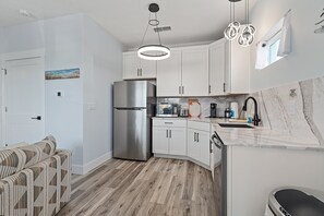 Fridge, microwave, dishwasher, coffee/tea maker