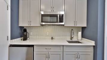 Fridge, microwave, coffee/tea maker, toaster