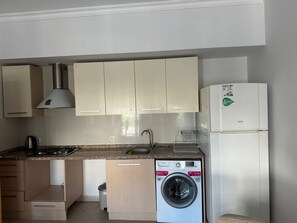 Basic Apartment, Balcony, Park View | Private kitchen | Full-size fridge, stovetop, cookware/dishes/utensils