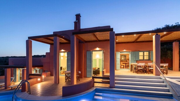 A modern house with a swimming pool, outdoor seating, and a covered patio area. - Villa Malia, Eco-Chic Villa with SeaViews (Syros)