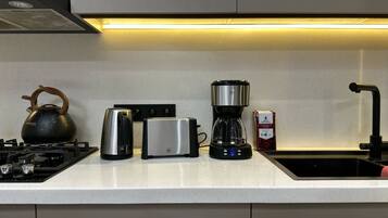 Luxury Apartment, City View | Iron/ironing board, cribs/infant beds, rollaway beds, free WiFi