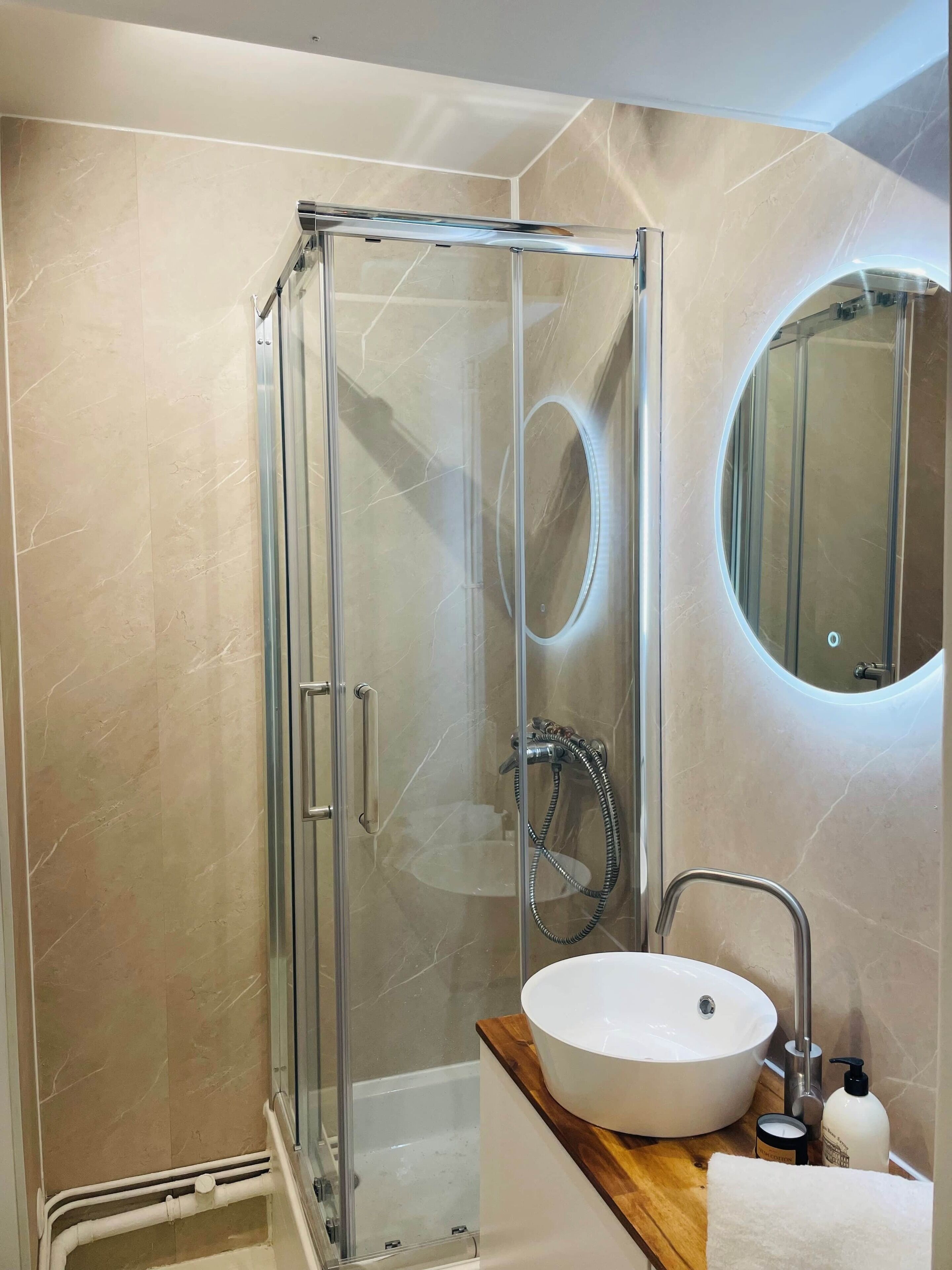 Hair dryer, towels, soap, shampoo