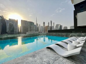 Pool - Spacious Balcony Overlooking the Burj Khalifa & City Skyline, Near Bus Station (Dubai)