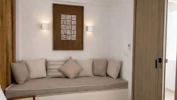 Deluxe Studio, Balcony, Garden View | Living area | 40-inch Smart TV with digital channels