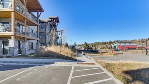 A multi-story building with balconies and a parking lot. - 5 Mi to Winter Park Skiing & Dtwn: Mtn-view Condo (Fraser)