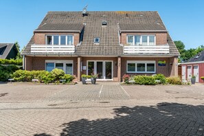 Exterior - Apartment, 20 sqm, living/sleeping area with kitchenette, private terrace, max. 2 guests (Wangerland)