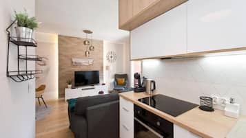 Apartament typu Comfort 75 | Quartos à prova de som, ferros/tábuas de passar roupa, Wi-Fi de cortesia