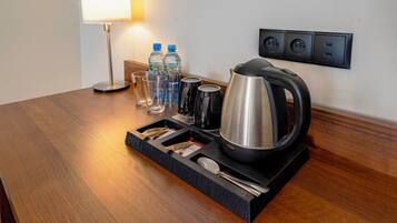 Standard Double Room | Living area | 20-inch plasma TV with satellite channels