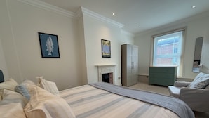 2 slaapkamers, een strijkplank/strijkijzer, gratis wifi, beddengoed