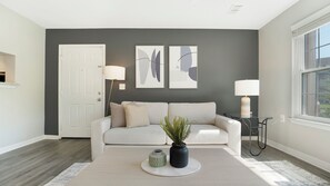 Standard Apartment (1 Bedroom) | Living area | 50-inch TV with digital channels - Landing Furnished Apartments Central Cleveland (Cleveland)