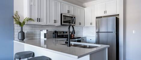 Departamento (1 Bedroom) | Cocina privada | Refrigerador y cafetera y tetera