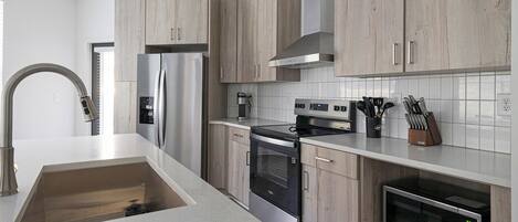 Departamento (2 Bedrooms) | Cocina privada | Refrigerador y cafetera y tetera