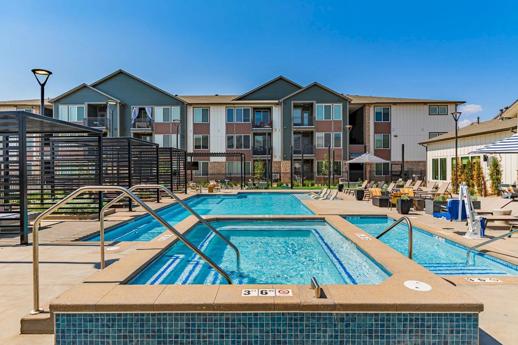 Seasonal outdoor pool, pool loungers