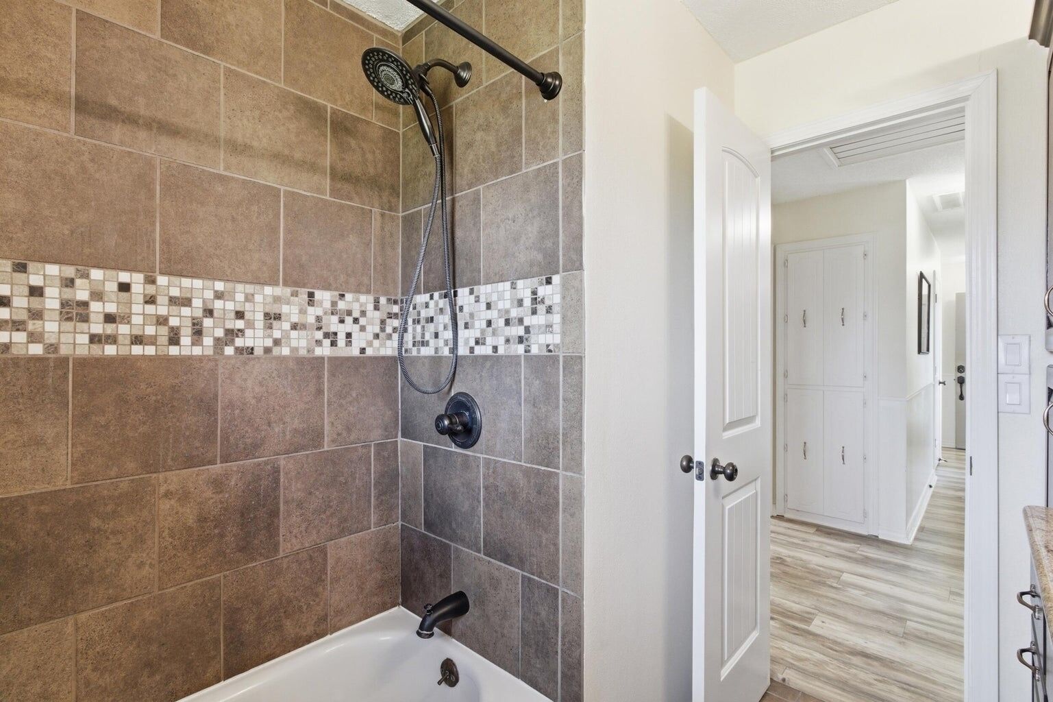 Shower, hair dryer, towels, toilet paper