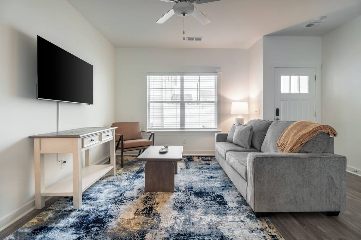Apartment (2 Bedrooms) | Living room | 50-inch Smart TV with digital channels