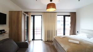 Iron/ironing board, bed sheets - Bright Gudauri Studio Apartment - By Wehost (Gudauri)