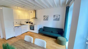 Apartamento, 1 quarto | Área de estar