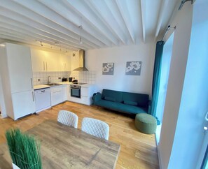 Apartamento, 1 quarto | Área de estar